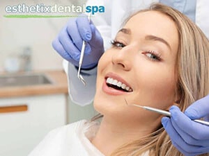 A woman having a cosmetic dentistry treatment in Washington Heights, NY.