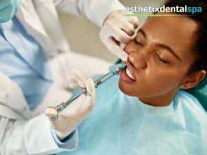 Patient receiving sedation dentistry for a pain-free dental procedure